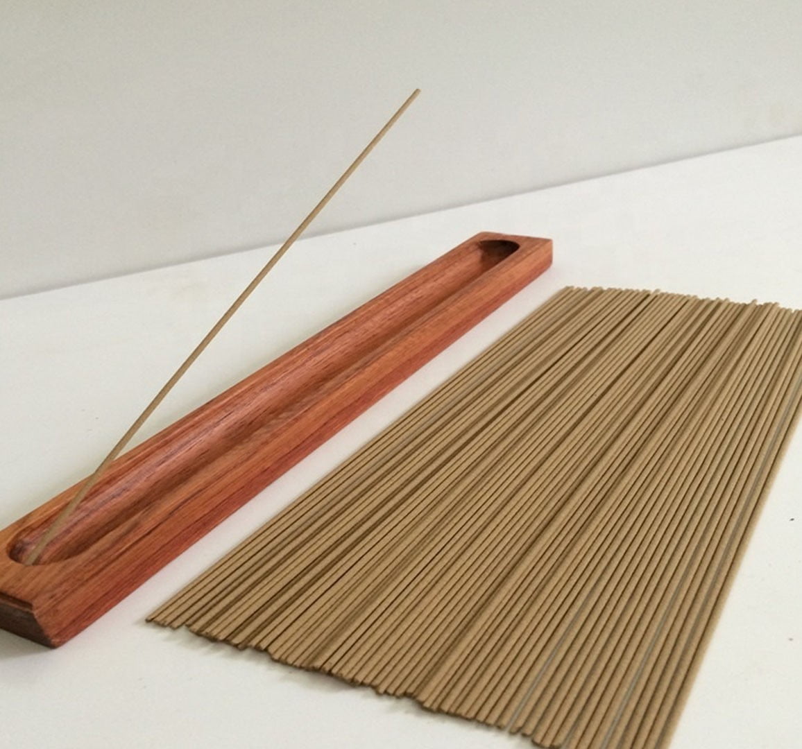 Solid incense sticks fully encased in joss powder